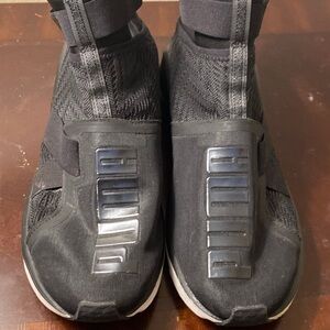 PUMA Women’s Black Slip-On Sneakers